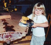 Katherine Palm Sanding the Deck.jpg