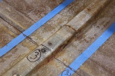 2 - Cracks and fastener perforations in existing frames.JPG 2 - Cracks and fastener perforations in existing frames.JPG