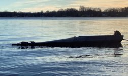 sm Tierney Scull - on water in silhouette.jpg