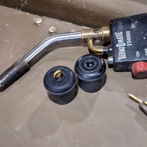 P - Tierney - brass screw eyes in rubber caps.jpg