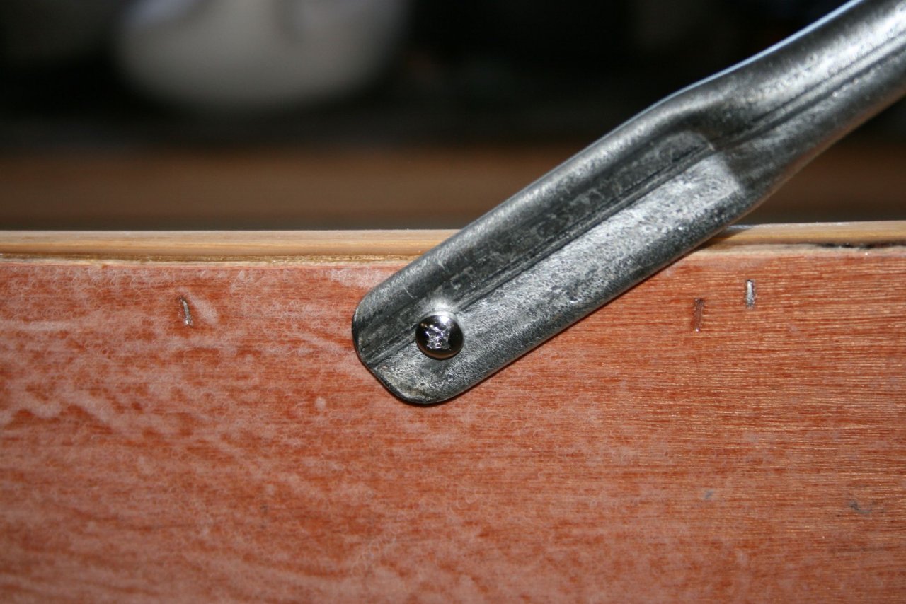 sm 17. Bow ends rounded on grinder then screwed through hull into gunwale..jpg